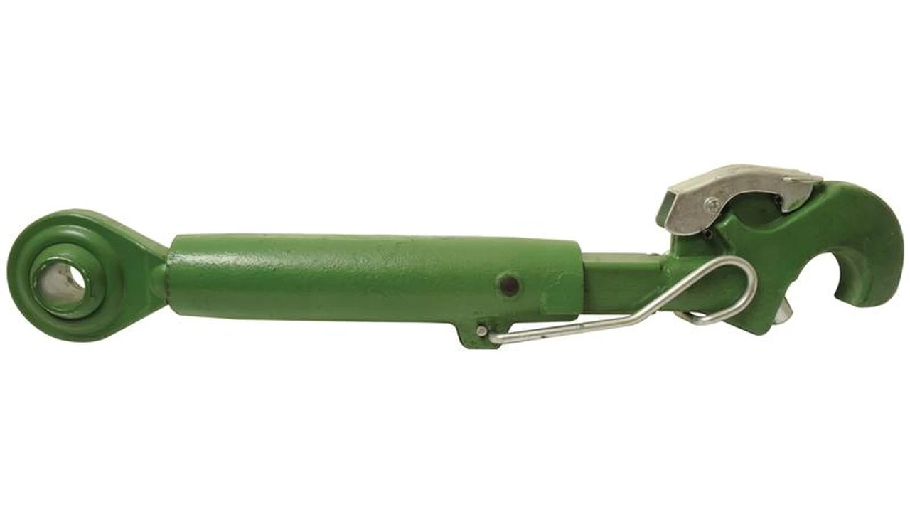 Close up on a plate of mashed potatoes, topped with baked pork chops with cream of mushroom soup, and a side of green beans.